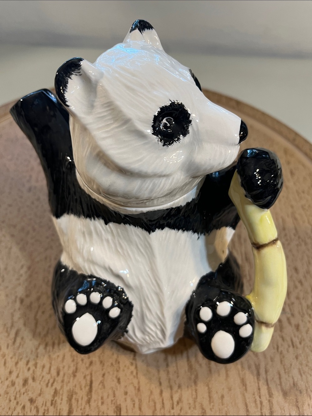Hand-Painted Ceramic Panda Figurine with Yellow Bamboo Accent